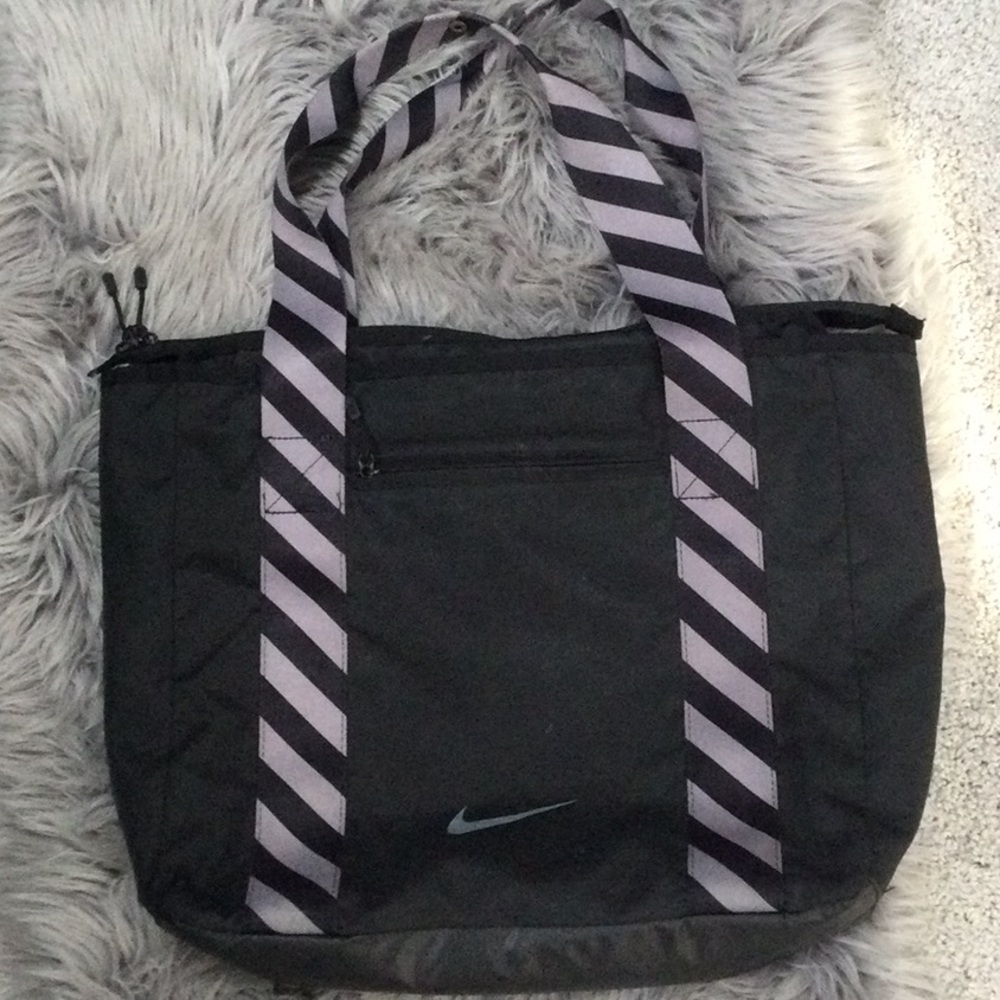 Nike tote bag.  Striped handles.
